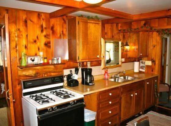 #5 - Times Square 2 Bedroom Cabin by RedAwning is a family friendly hotel in Carp Lake, Michigan (MI)