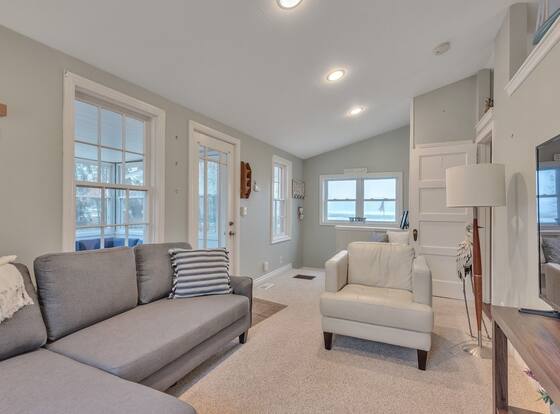 Amazing Lakefront Retreat On Long Lake! 2 Bedroom Home by RedAwning is a family friendly hotel in Comstock Northwest, Michigan (MI)