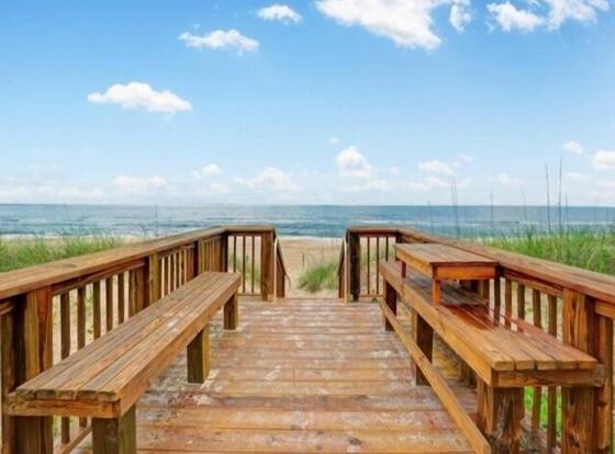 Sea Fever - Newly Renovated Oceanfront Second Floor Condo! Sunrises And Sweeping Views! 2 Bedroom Condo by Redawning is a family friendly hotel in Carolina Beach, North Carolina (NC)